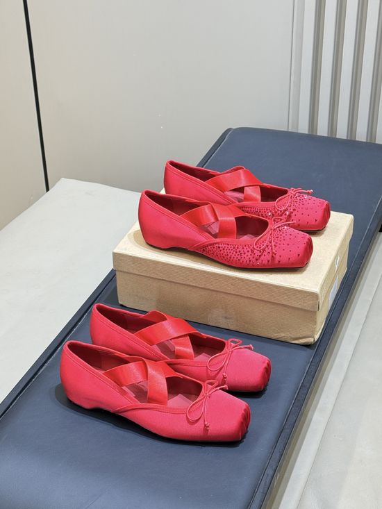 Christian Louboutine Elegant Ballet Flats with Bow and Cut-Out Design