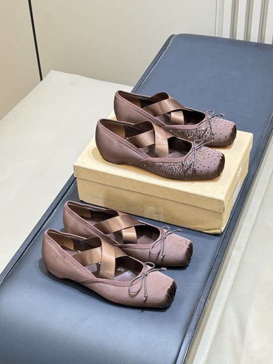 Christian Louboutine Elegant Ballet Flats with Bow and Cut-Out Design