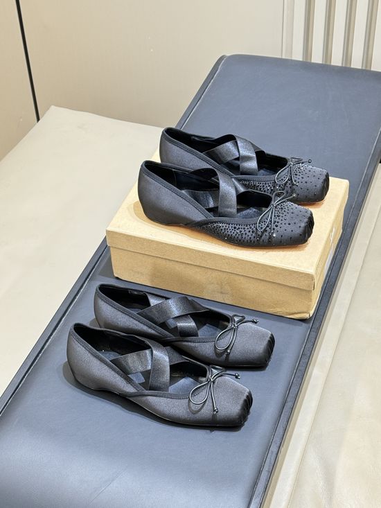 Christian Louboutine Elegant Ballet Flats with Bow and Cut-Out Design