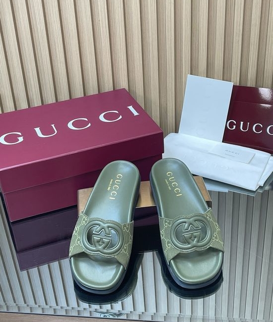 Gucci Embossed Logo Leather Platform Slide Sandals