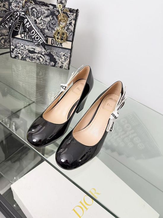 Christian Dior Elegant Ballet Flats with Lace-Up Detail and Bow