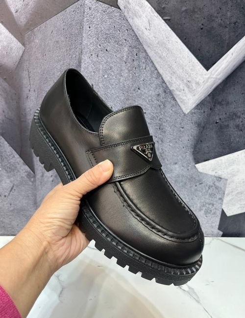 Prada Enamel Logo Leather Loafers