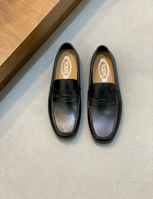 Tods Classic Loafers With Twisted Logo Design