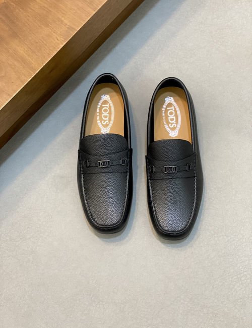 Tods Classic Loafers With Twisted Logo Design
