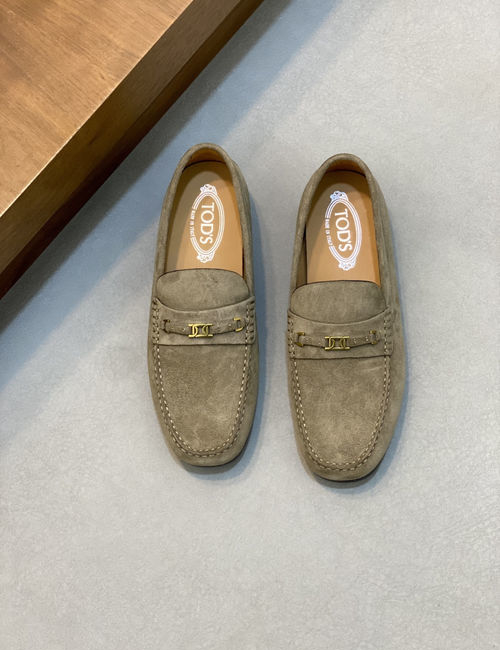 Tods Classic Loafers With Twisted Logo Design