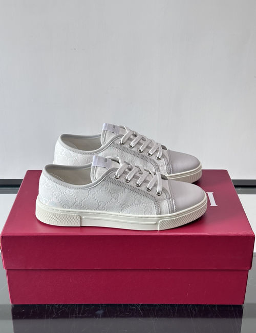 Gucci GG Embossed Leather Sneakers