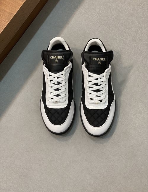 Chanel Quilted Leather Sneakers With Logo