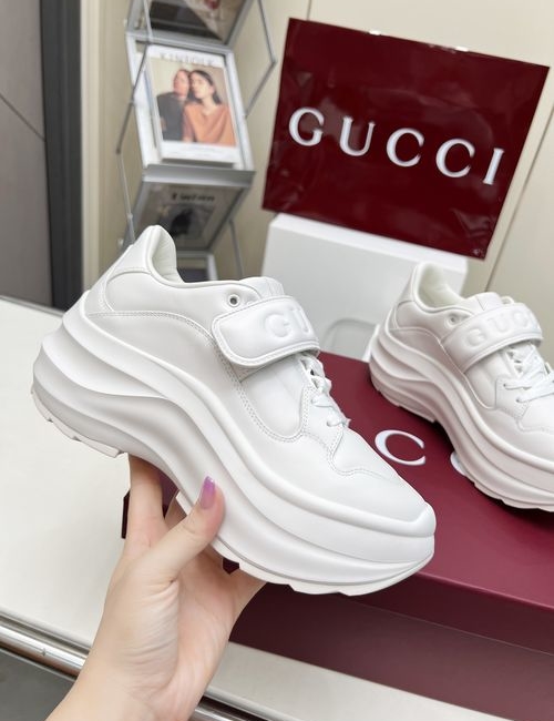 Gucci Slip-On Sneakers With GG Embossed Leather