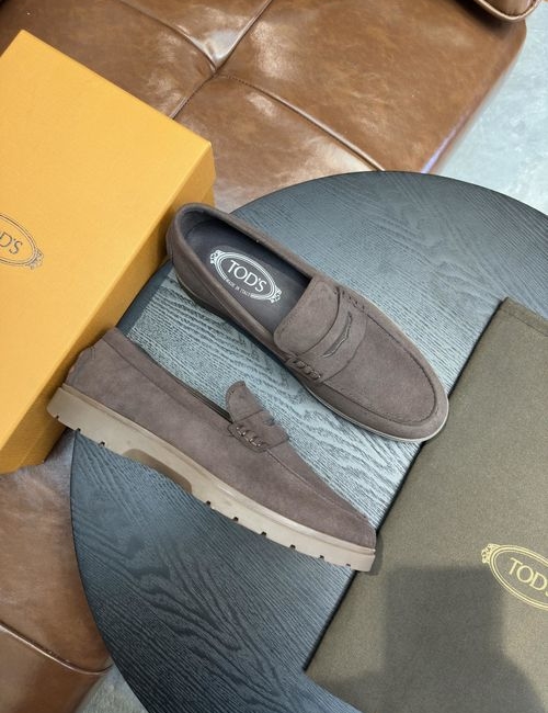 Tods Calfskin Loafers With Woven Trim Soles