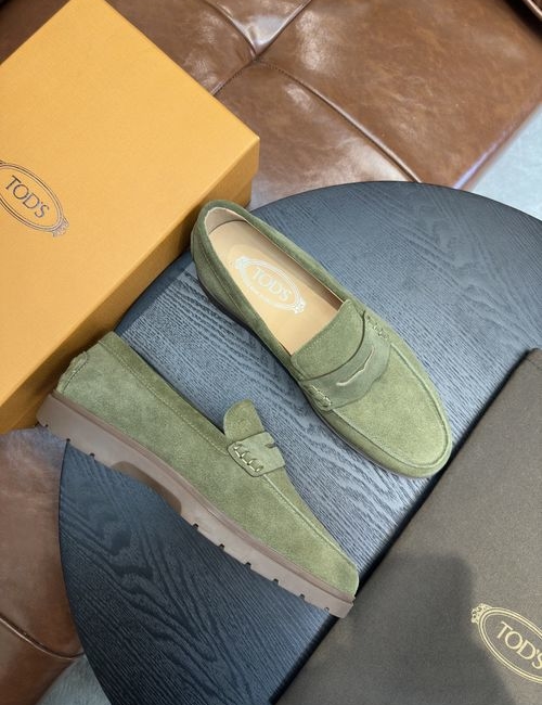 Tods Calfskin Loafers With Woven Trim Soles
