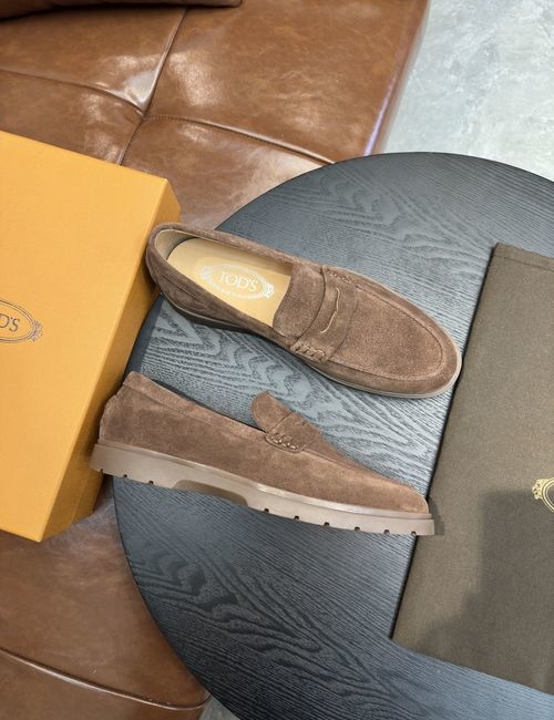 Tods Calfskin Loafers With Woven Trim Soles