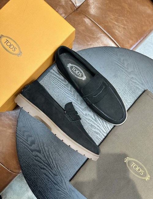 Tods Calfskin Loafers With Woven Trim Soles