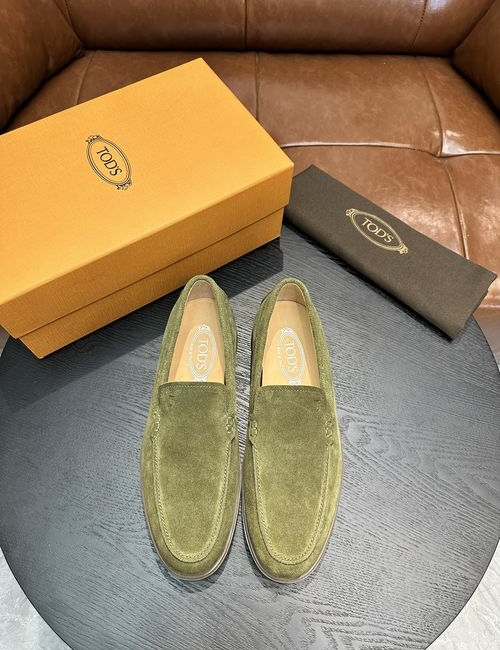 Tods Calfskin Loafers With Woven Trim Soles