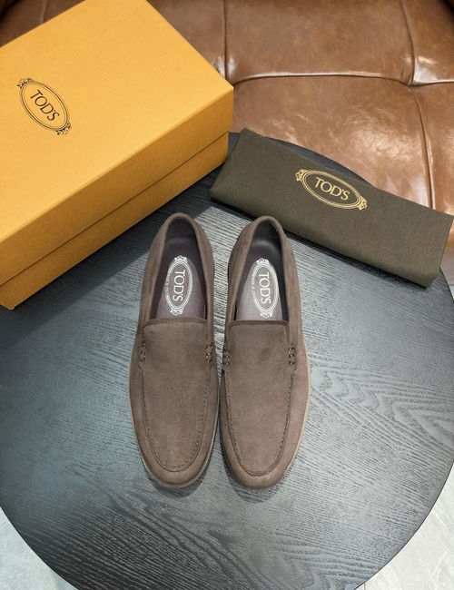 Tods Calfskin Loafers With Woven Trim Soles