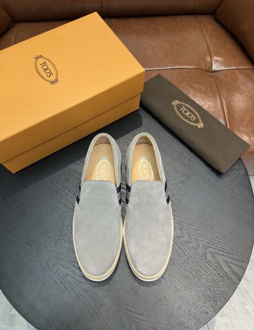 Tods Calfskin Loafers With Woven Trim Soles