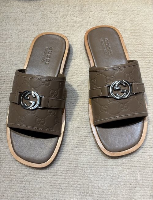 Gucci Interlocking G Slides. Classic Design. Leather Details.