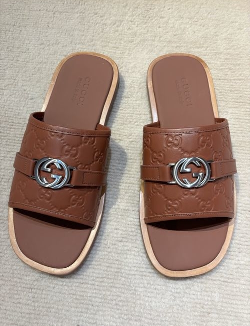 Gucci Interlocking G Slides. Classic Design. Leather Details.