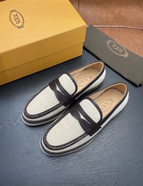 Tods Calfskin Loafers With Woven Rubber Sole