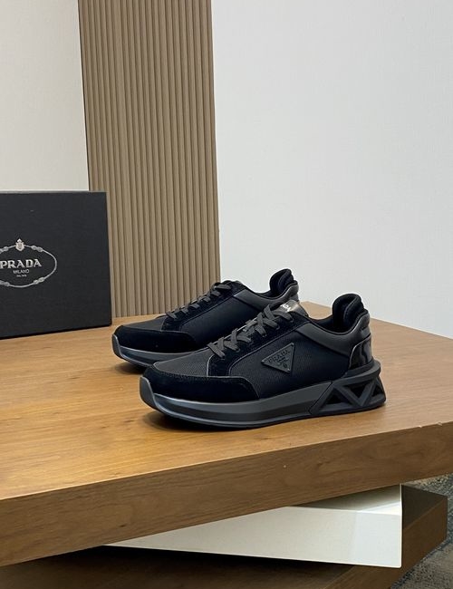 Prada Mesh Paneled Leather Sneakers