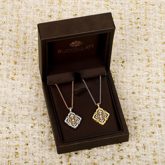 Celine Rotating Four Petal Hollow Necklace