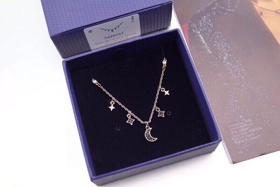 Swarovski Star Moon Pendant Necklace in Rose Gold