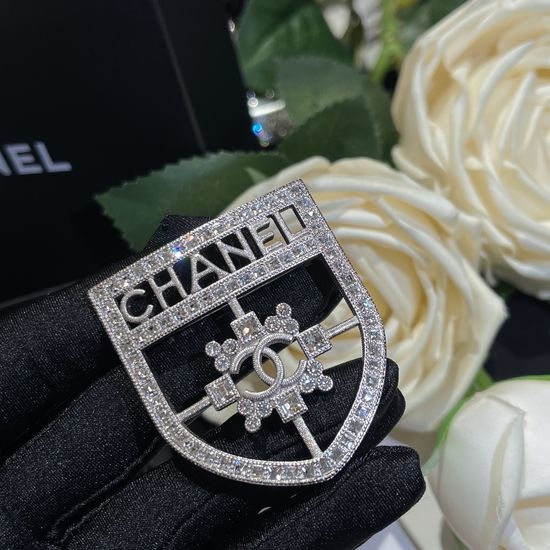 Chanel Shield Rhinestone Brooch Elegant Design