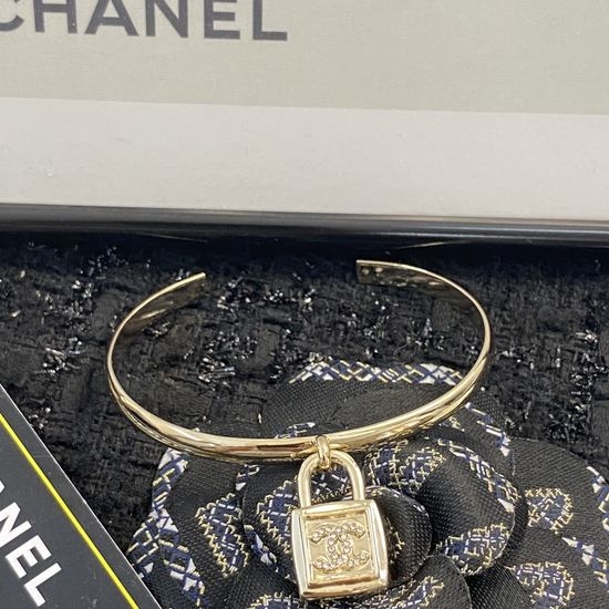 Chanel Lock Pendant Open Bangle Minimalist Design