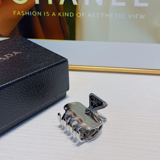 Prada Triangular Logo Metal Hair Claw