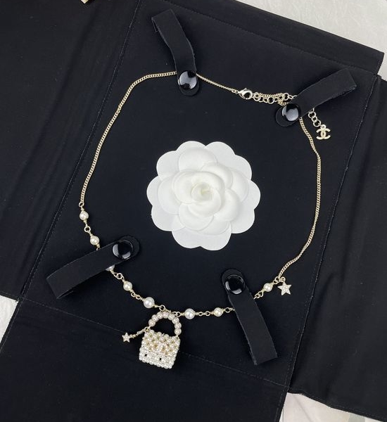 Chanel Hand-knitted Pearl with Starry Double C Necklace