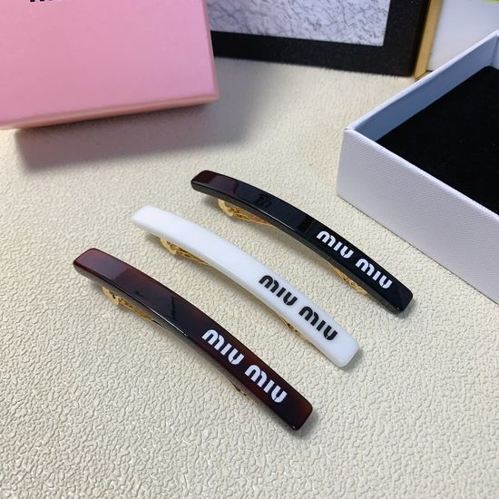Miu Miu Acrylic Spring Hair Clip Elegant Accessory