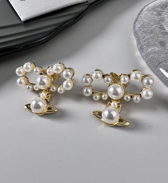 Vivienne Westhood Bowknot Planet Stud Earrings