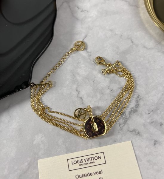 Louis Vuitton LV Multi Chain Bracelet with Bag Pendant