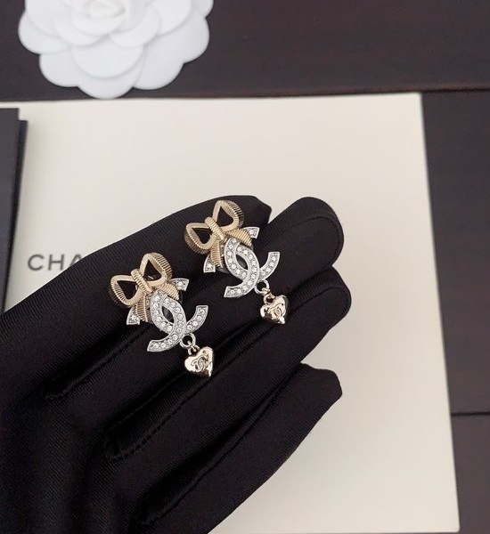 Chanel Two-tone Bow Earrings