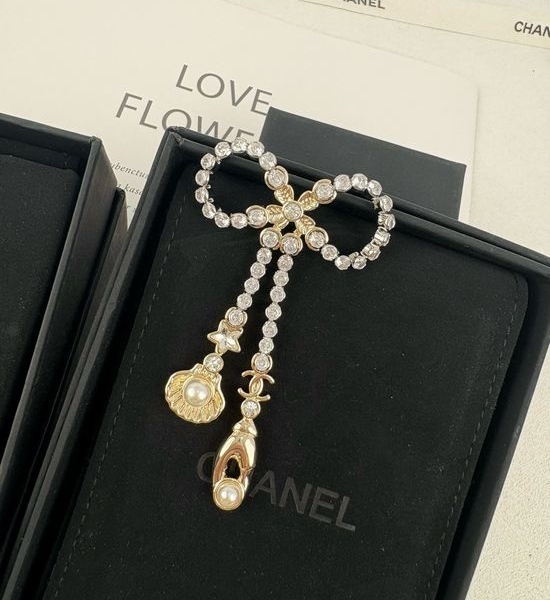 Chanel Bow Shell Tassel Elegant Brooch