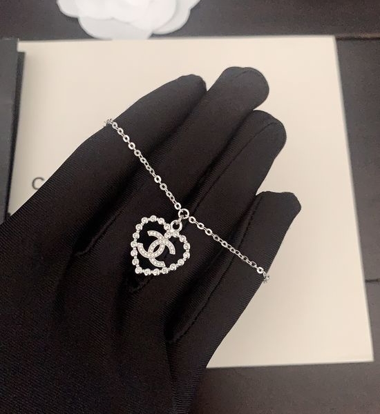 Chanel White Gold Hollow Heart Bracelet