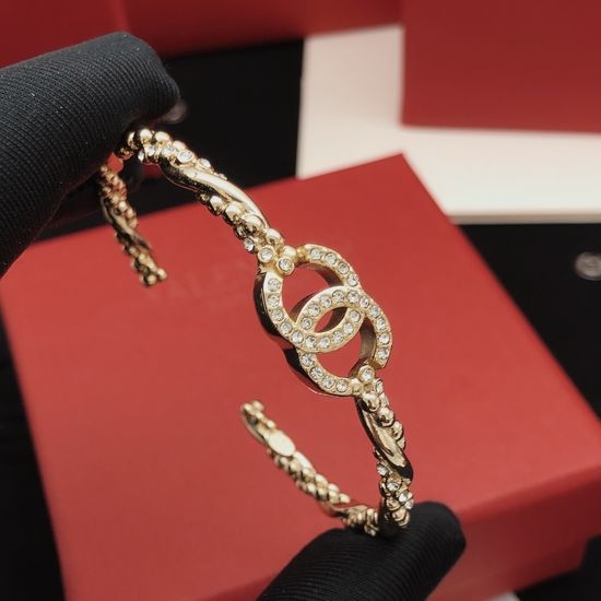 Chanel Twisted Design Polished Metal Bangle