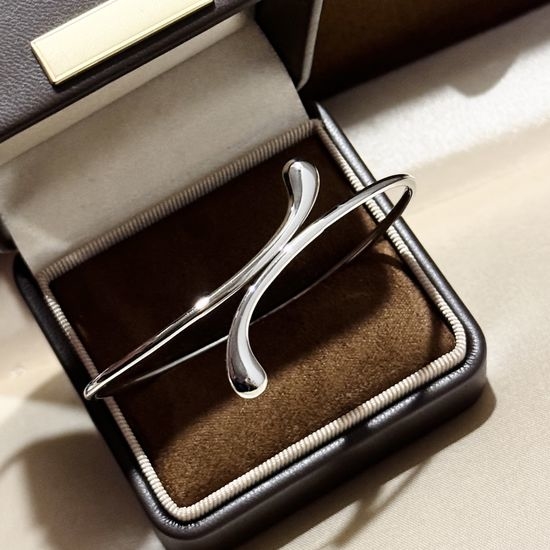 Tiffany & Co. Minimalist Water Drop Polished Open Bangle