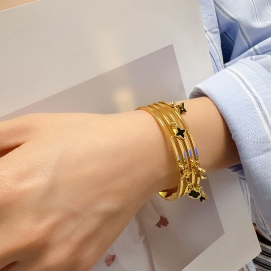 Louis Vuitton LV Hollow Carved Multi Charm Bangle