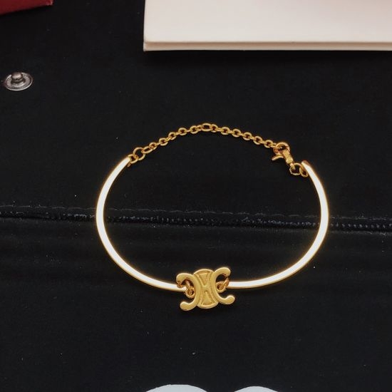 Celine Smooth Solid Brass Bangle
