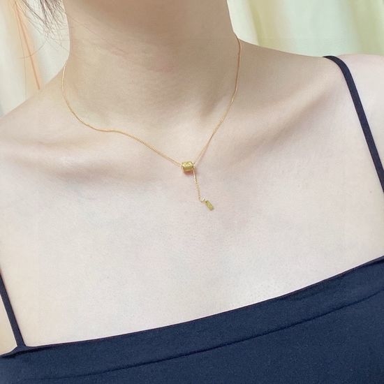 Celine Hollow Carved Round Pendant Necklace