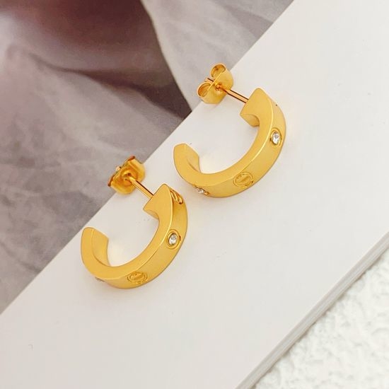 Cartier Polished Gold Diamond Accent Stud Earrings
