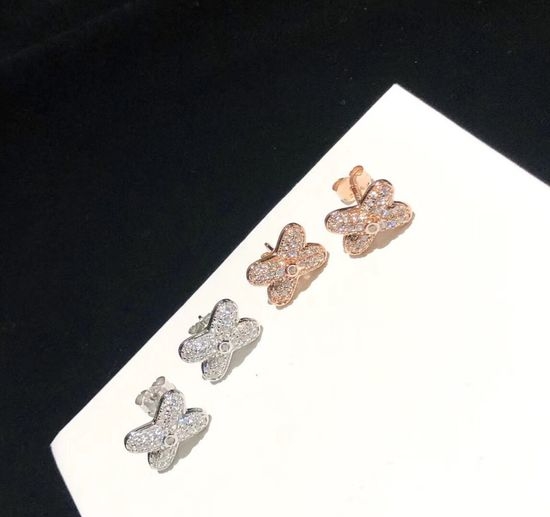Chaumet Cross Shaped Full Diamond Stud Earrings