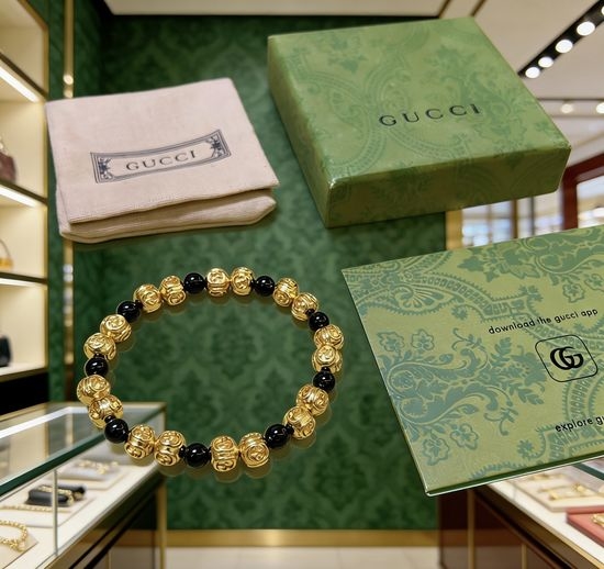 Gucci Onyx Gold Accent Elegant Bracelet