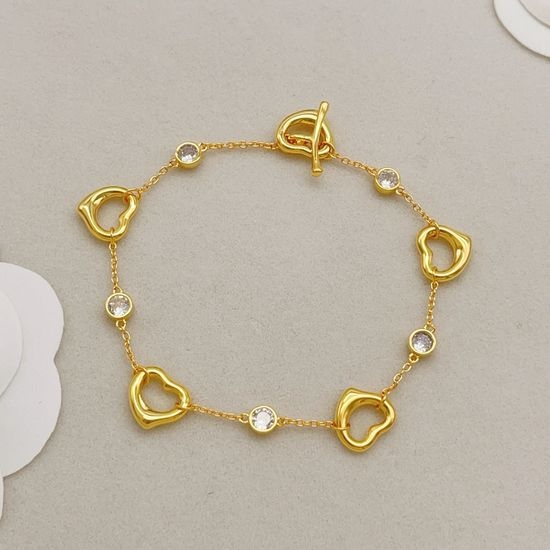 Tiffany & Co. Golden Diamond Inlaid Heart Bracelet