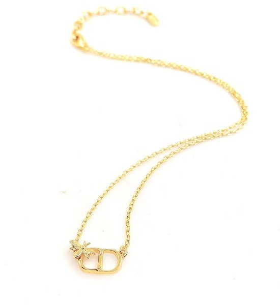 Christian Dior CD Gold CD Bee Pendant Necklace in Brass