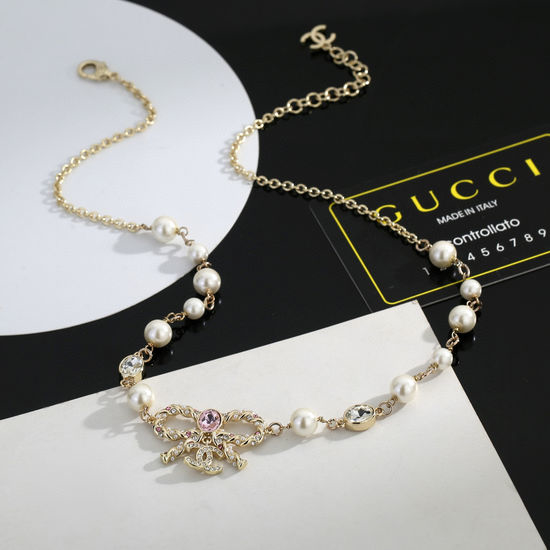 Chanel Bow Pearl Sweater Necklace