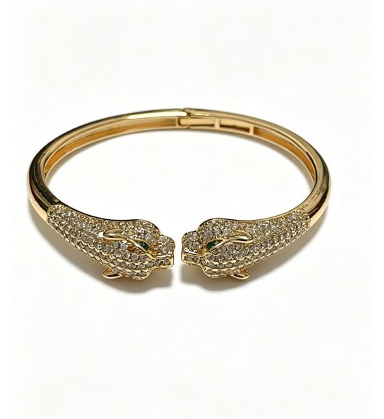 Cartier Elegant Gold Bangle Timeless Ring Detail