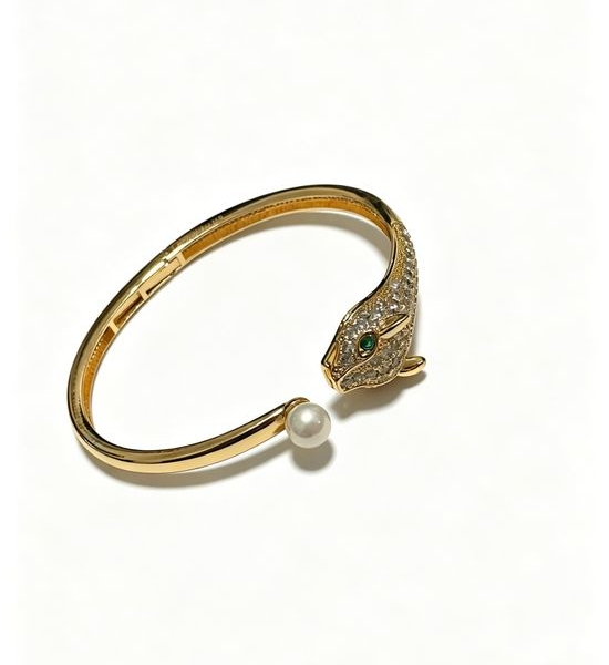 Cartier Elegant Gold Bangle Timeless Ring Detail